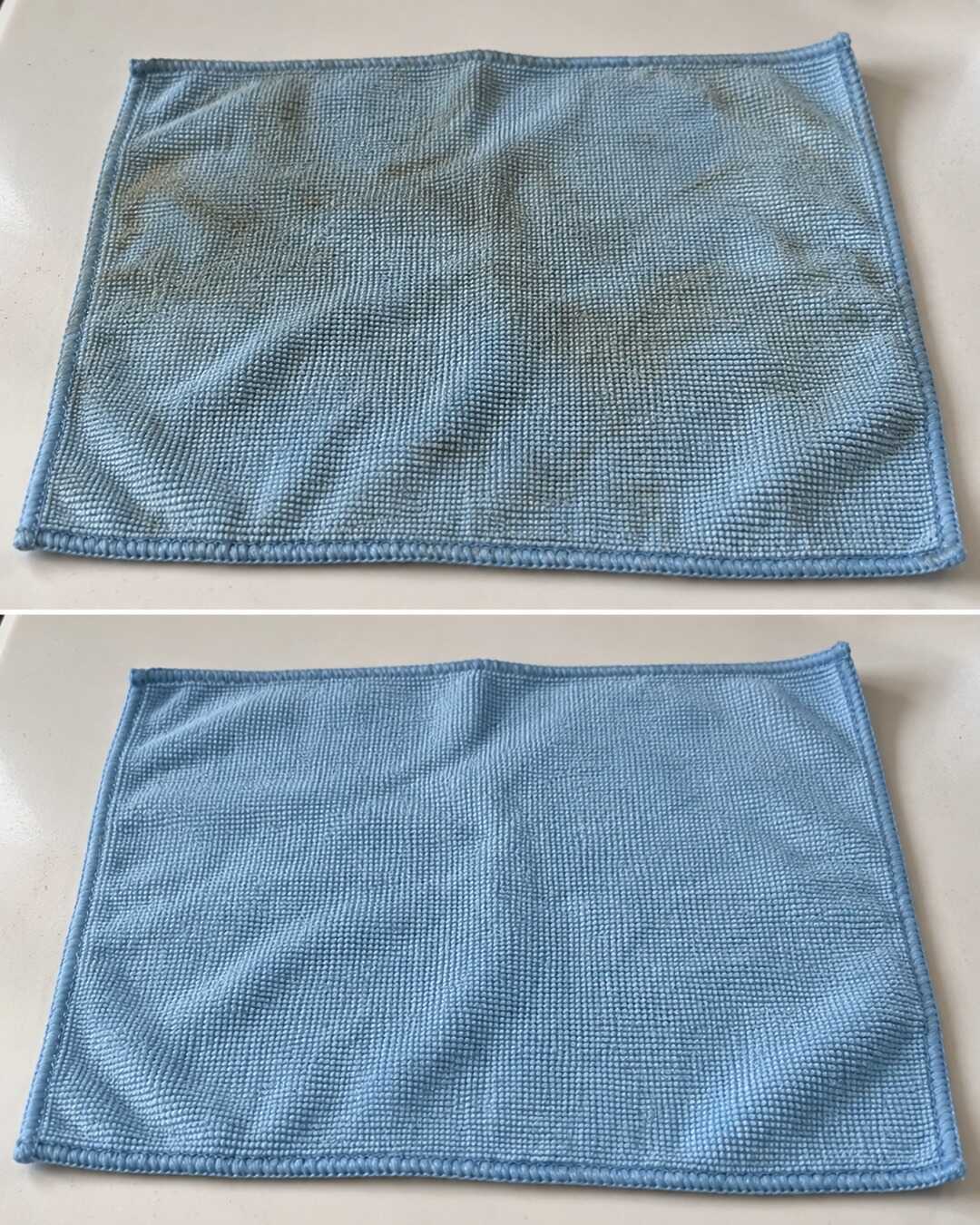 Same pale blue microfiber cloth laid flat on a white laundry worktop, lightly greasy and dull before top, washed clean after bottom; same weave and size, realistic no magical replacement.